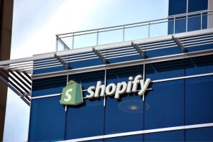Shopify posts profit as it winds up its logistics arm